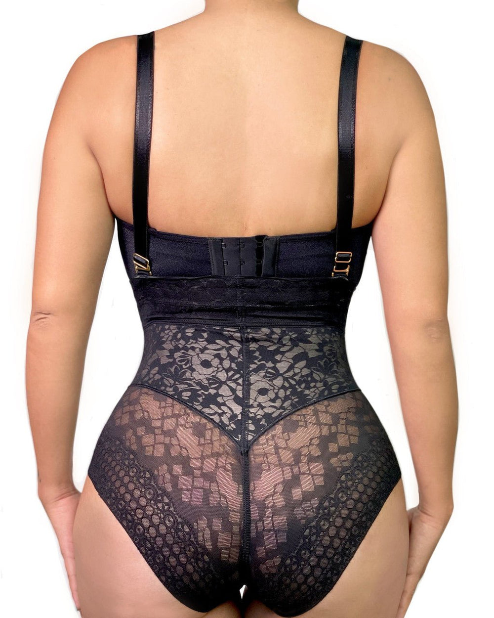 Black lace bodysuit worn by a model on a white background