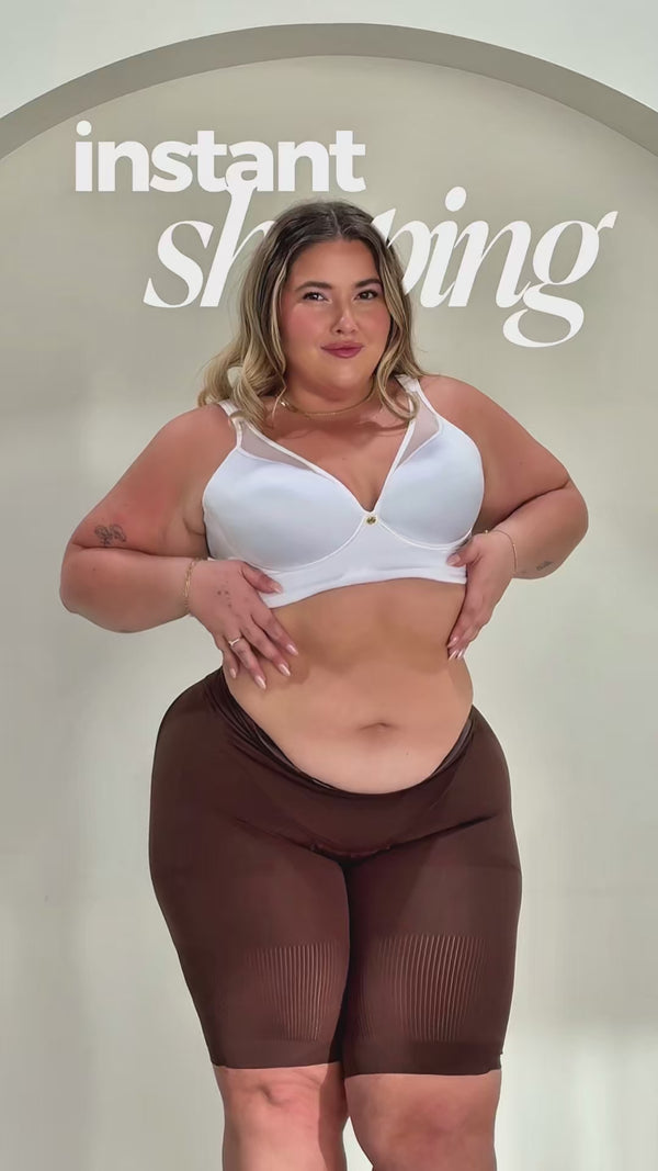 A model tries on the best selling shapewear